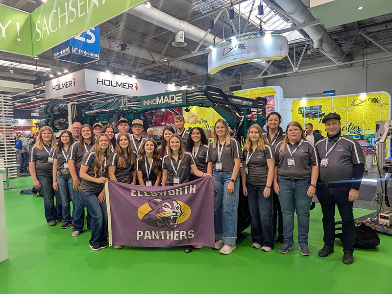 Students involved in PAS, grouped together for a photo at Ag event. 
