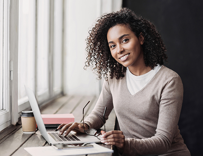 woman looking at computer