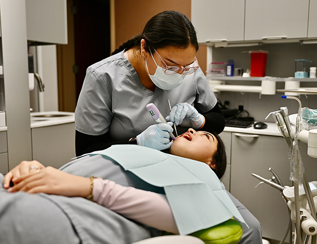 dental student working on patient