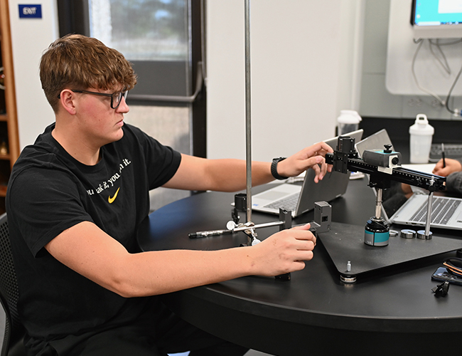 student working on lab